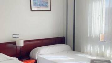 Desk, blackout curtains, soundproofing, free WiFi