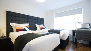 Apartment, 1 Bedroom | In-room safe, desk, iron/ironing board, free cots/infant beds - Arnos Apartments (London)