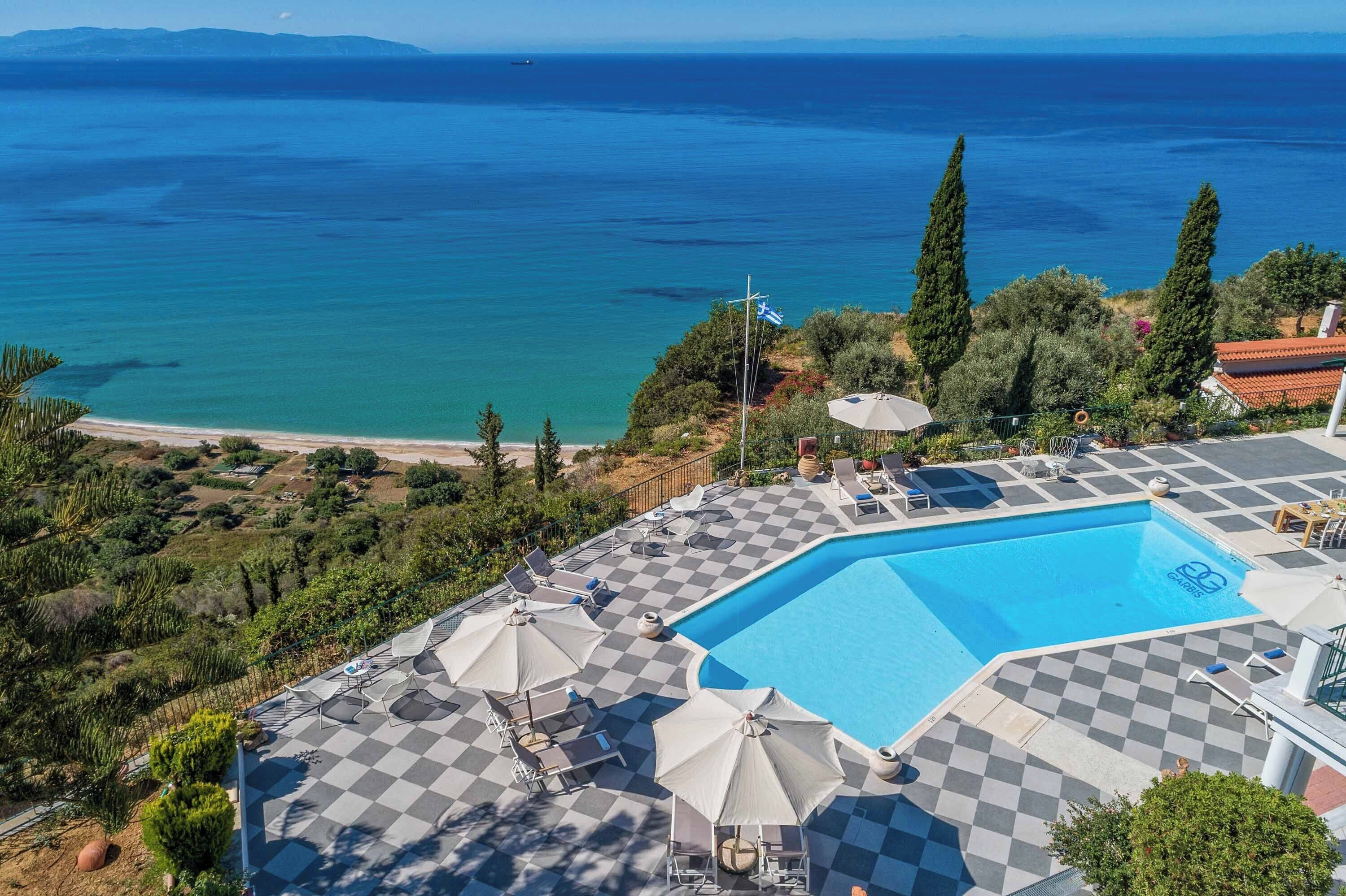 Outdoor pool, pool umbrellas, pool loungers