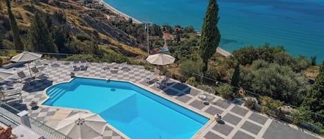 Outdoor pool, pool umbrellas, pool loungers