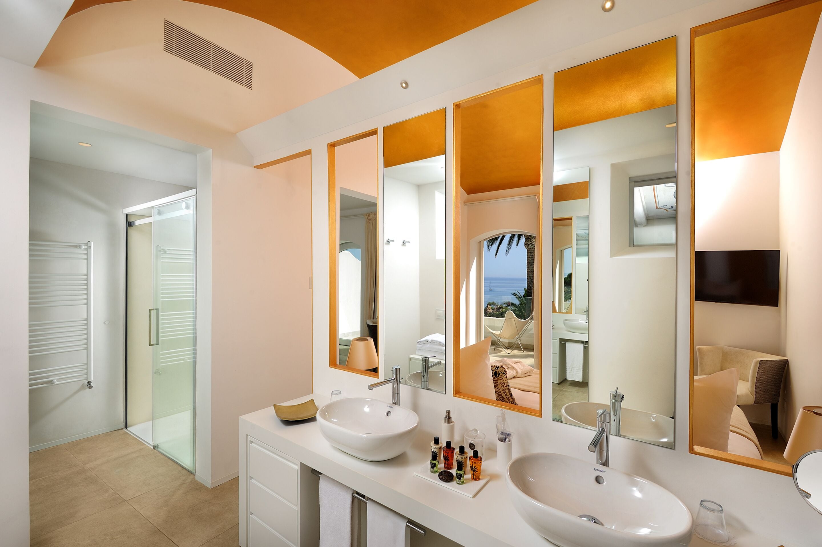 shower, jetted bath, rainfall showerhead, designer toiletries