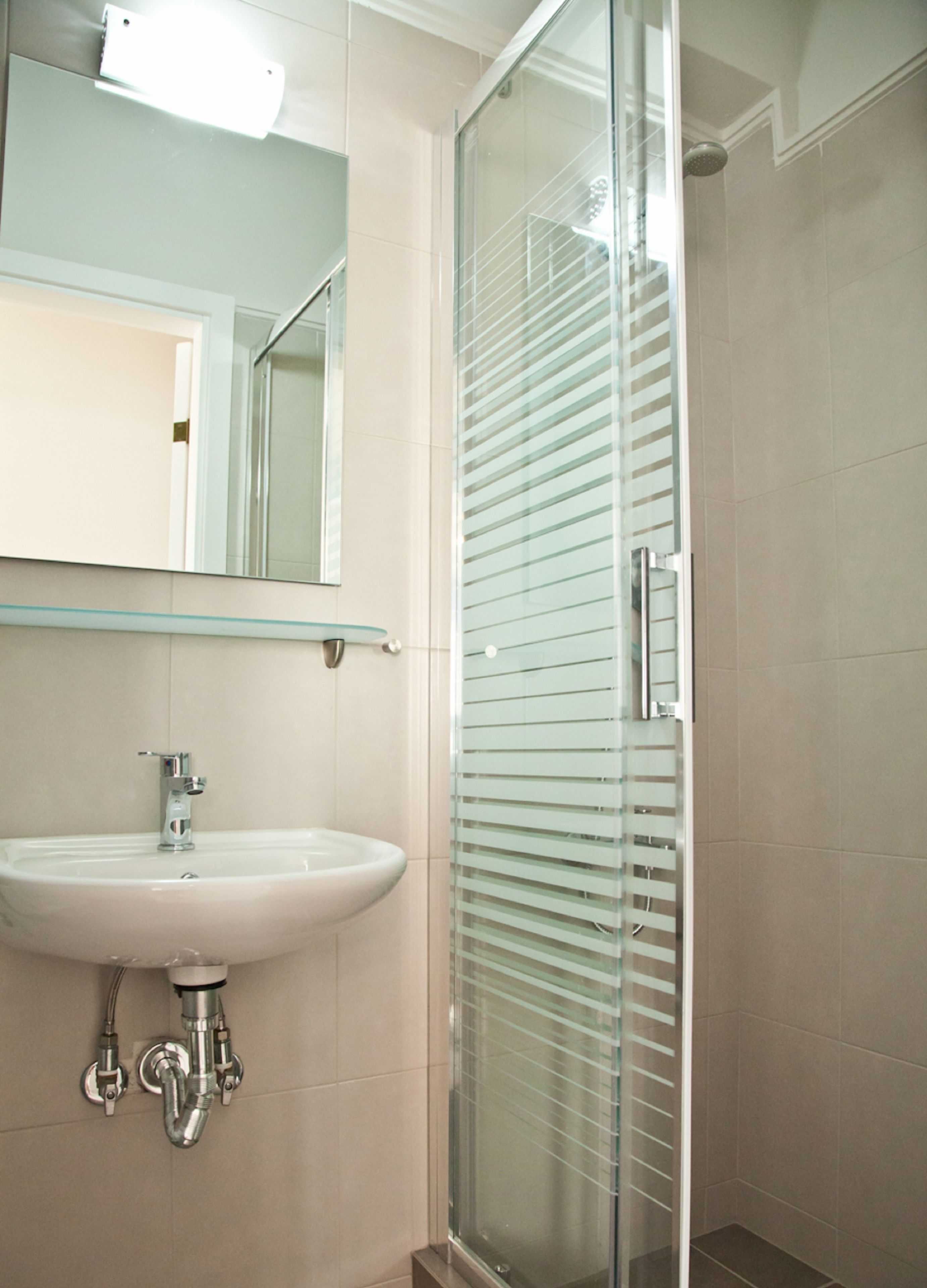 studio (4 adults) | bathroom | shower, free toiletries, hair dryer, towels