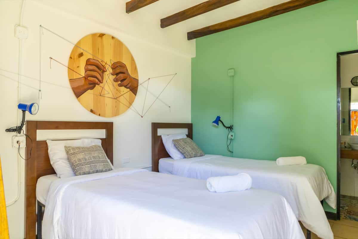 Chambre Standard avec lits jumeaux | Chambres insonorisées, Wi-Fi gratuit, draps fournis