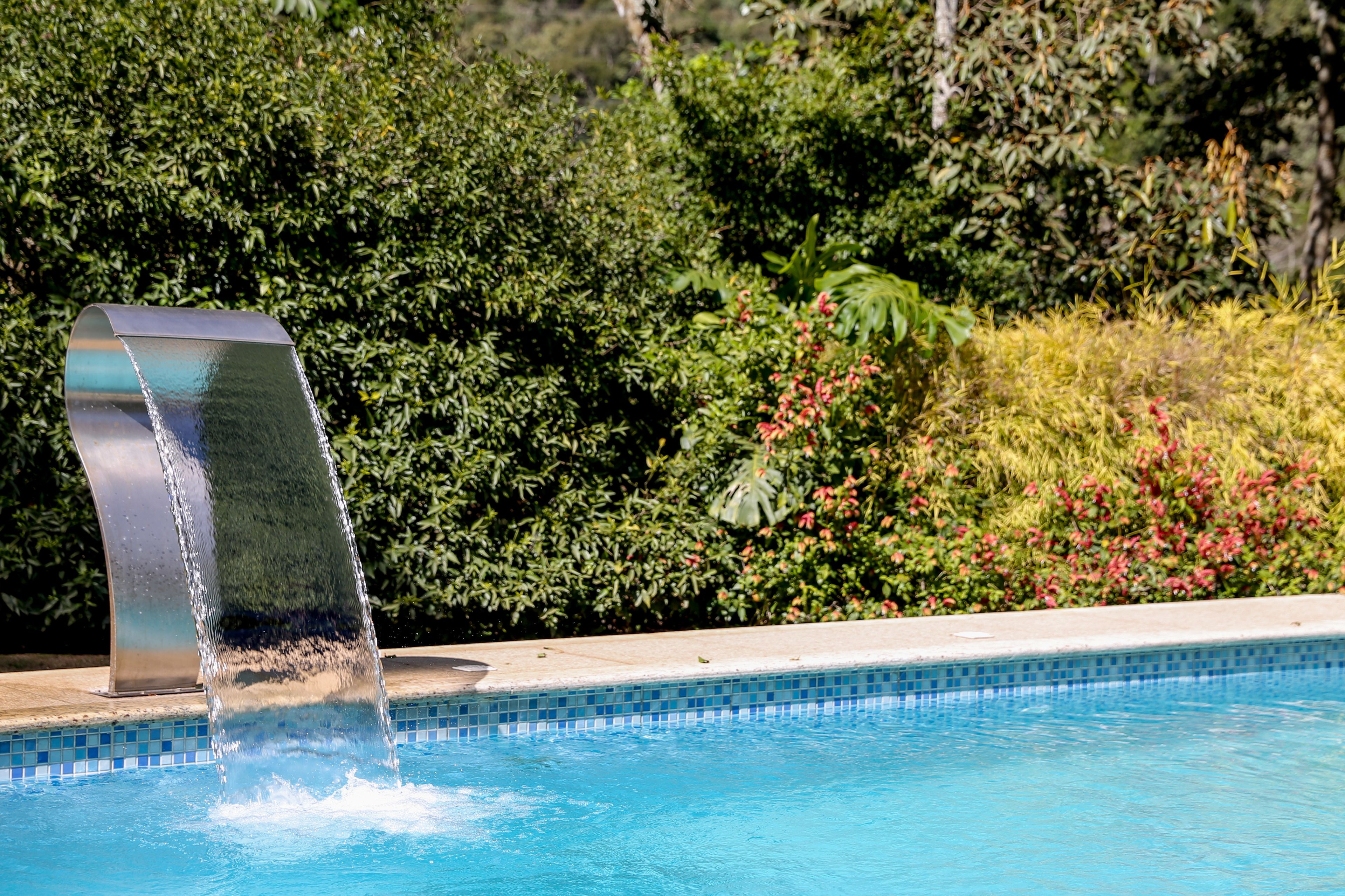 outdoor pool, pool umbrellas, pool loungers