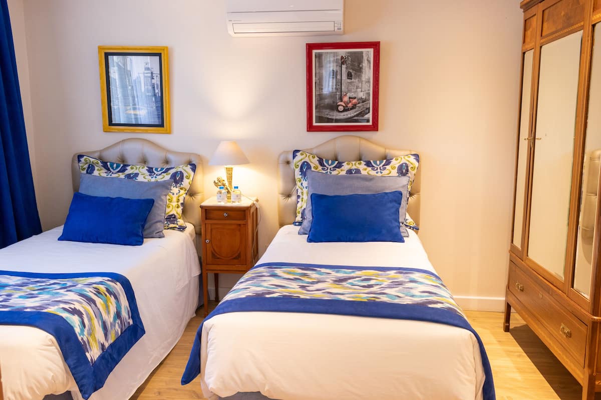 Family Suite, Multiple Beds | Premium bedding, minibar, in-room safe, blackout drapes