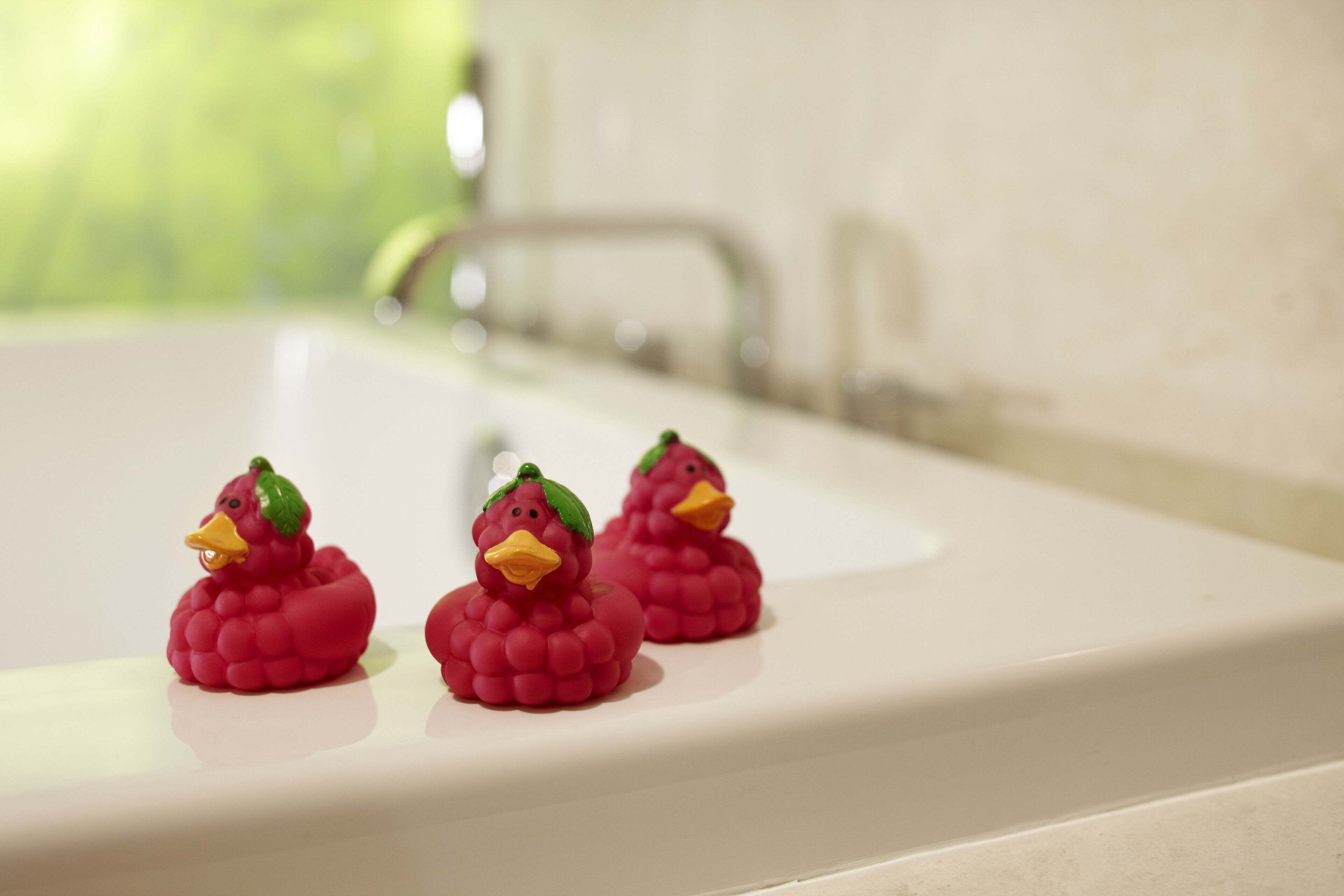 designer toiletries, hair dryer, bathrobes, slippers