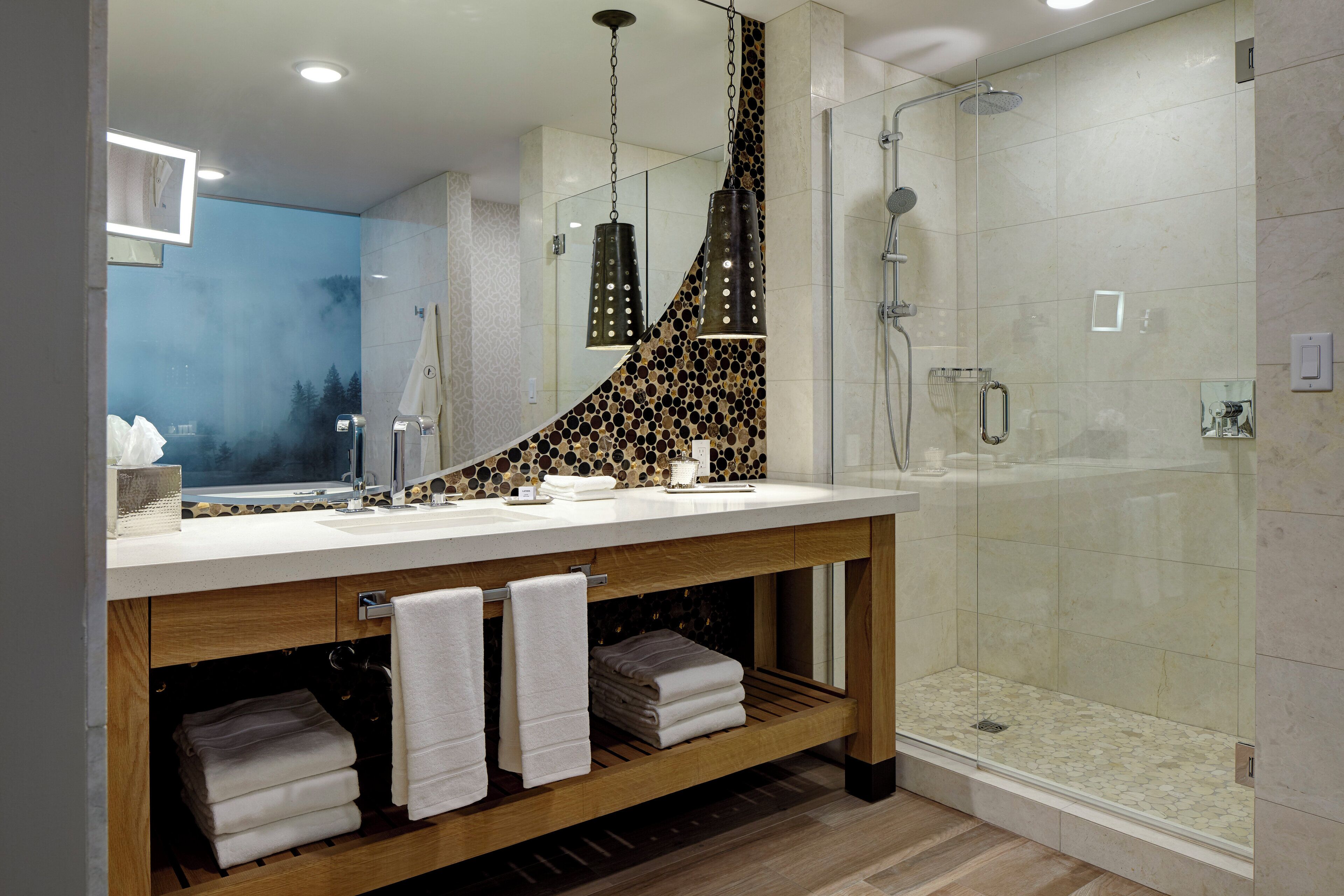 Designer toiletries, hair dryer, bathrobes, slippers