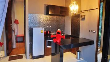 Fridge, microwave, stovetop, coffee/tea maker