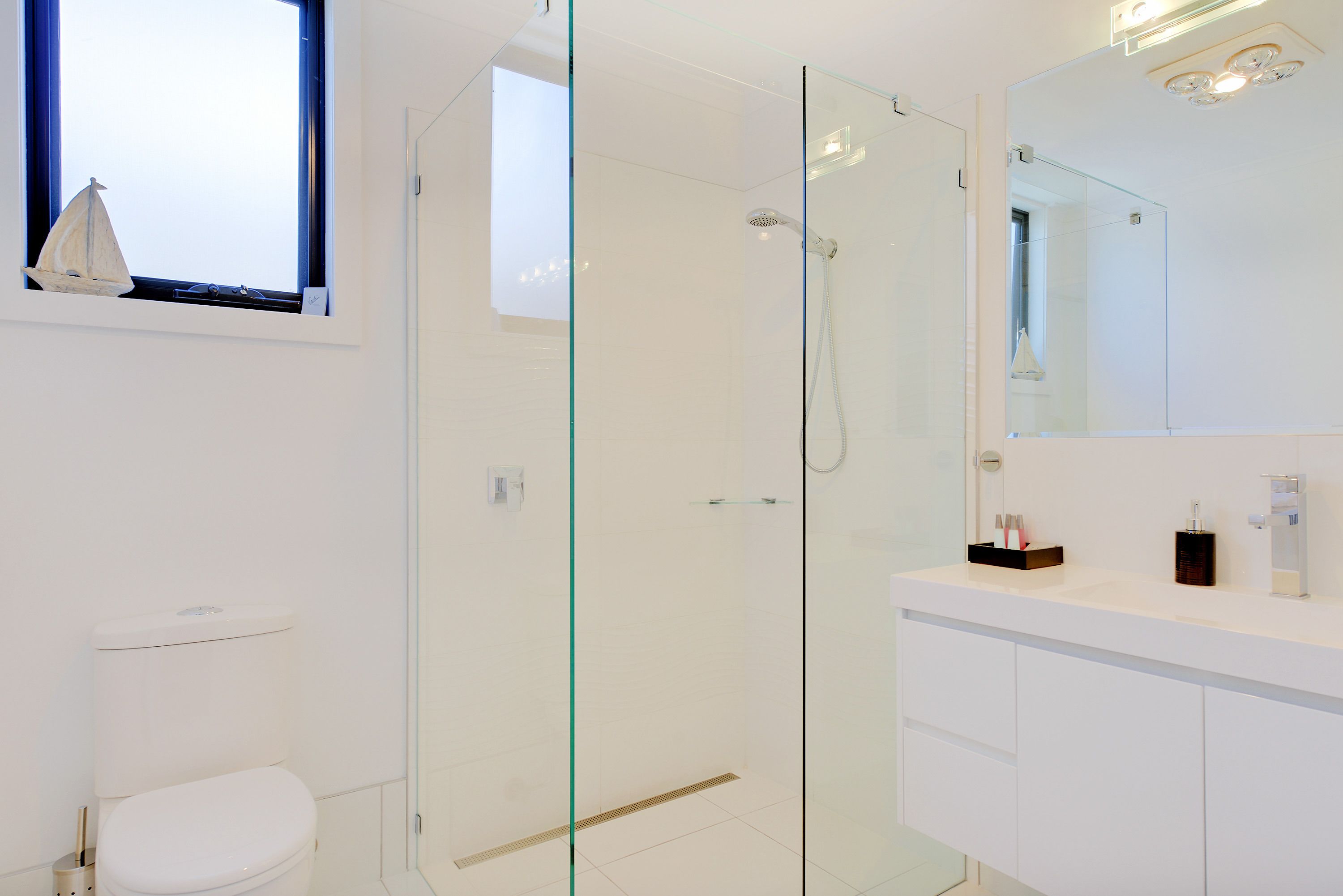 beach apartment, partial sea view (ground floor) | bathroom | designer toiletries, hair dryer, towels