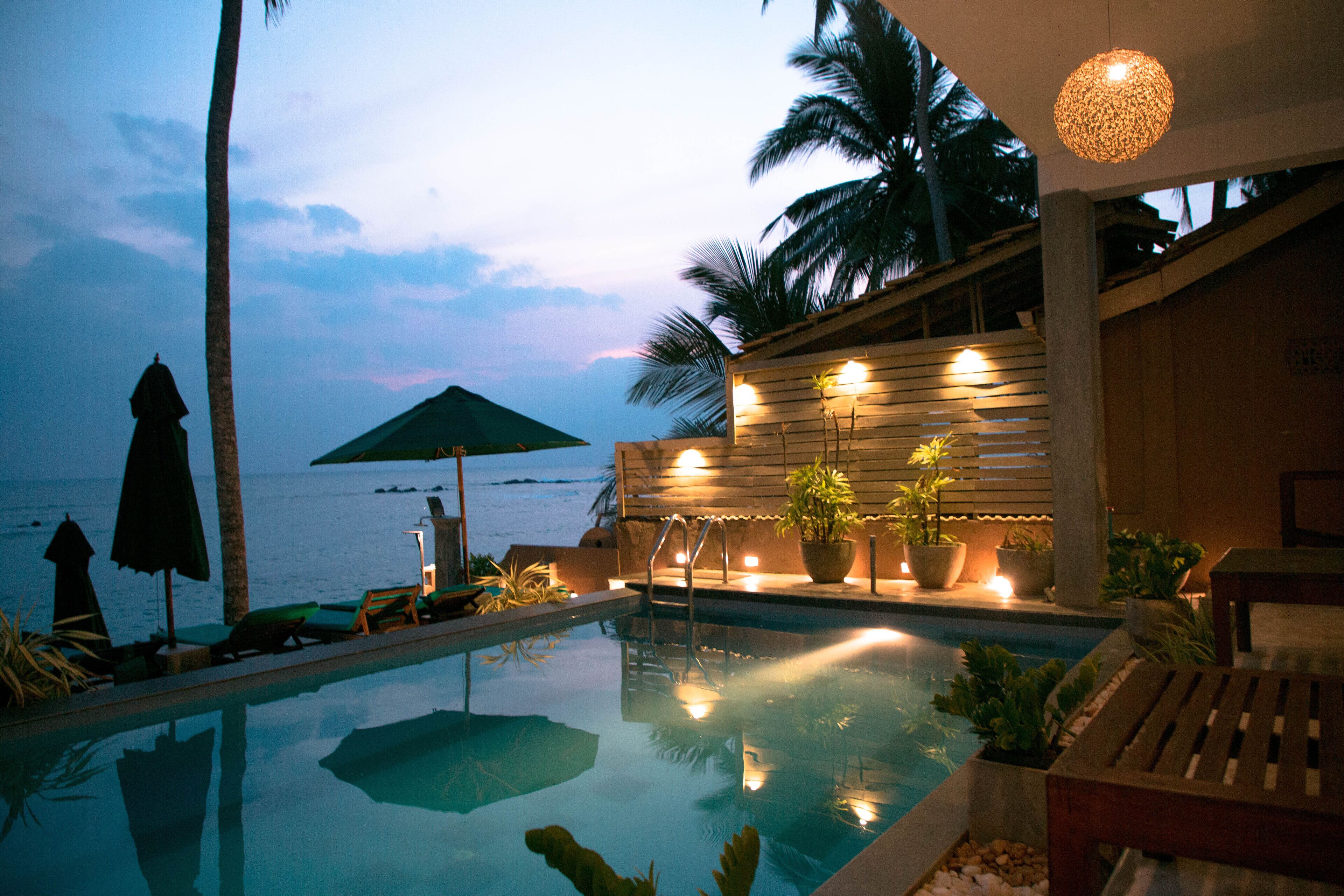 Outdoor pool, pool umbrellas, pool loungers