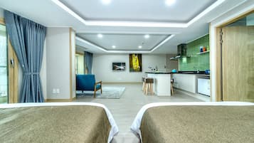 Family Room (Luxury A) | Premium bedding, blackout drapes