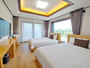 Chambre Familiale avec lits jumeaux | Wi-Fi gratuit, accès pour personnes à mobilité réduite