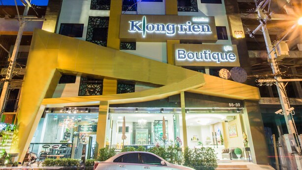 A building with a prominent 'Kong Rien Boutique' sign, featuring a modern design with a geometric logo. - Klongrien Boutique (Hat Yai)