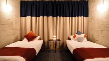 Desk, blackout curtains, free WiFi, bed sheets