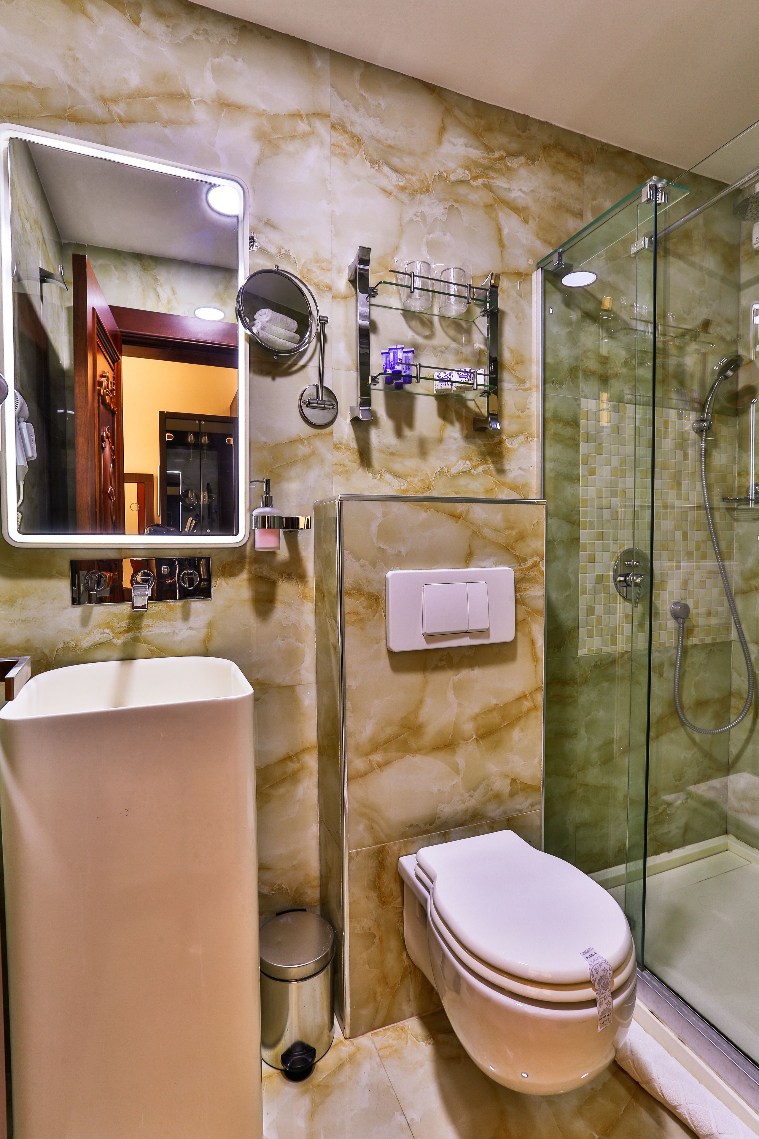 shower, free toiletries, bathrobes, slippers