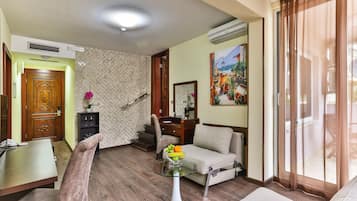 Family Suite, 2 Bedrooms | Living area | Fireplace