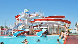 A water park with multiple slides and a pool area. - Hotel Hollywood (Rimini)