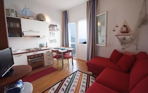 Apartment, 1 Bedroom | Living area | TV - Residence Paradiso (Laigueglia)