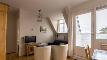 4 Pers. Appartement Tijgeroog | Zimmersafe, individuell dekoriert, Schreibtisch, Bettwäsche