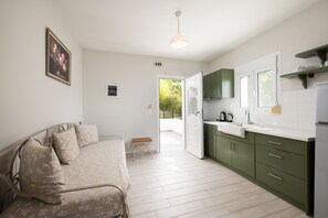 Superior Apartment, 1 Bedroom, Partial Sea View | Private kitchenette | Fridge, stovetop, electric kettle, cookware/dishes/utensils - Barefoot Contessa (Kefalonia)