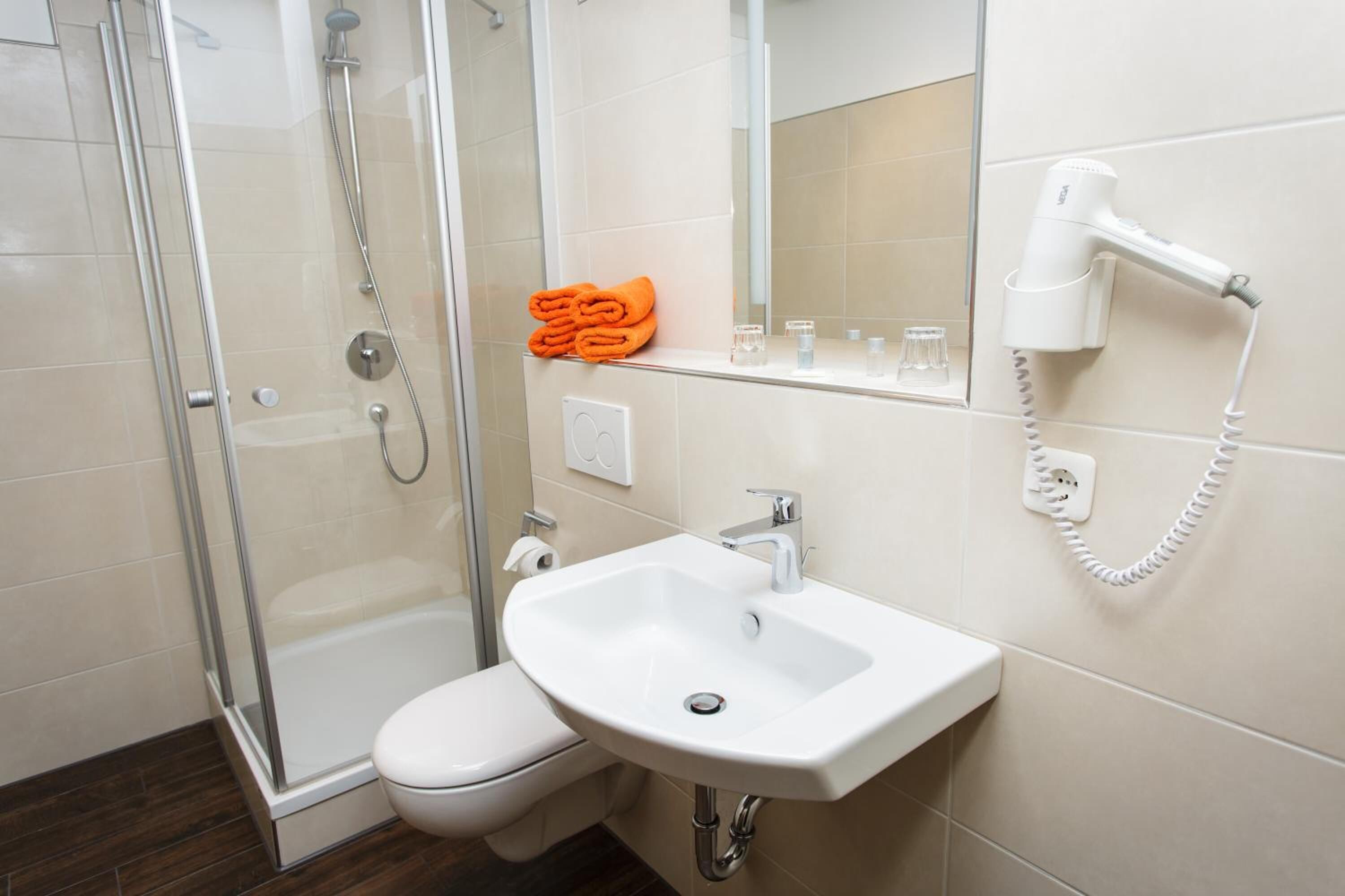 shower, free toiletries, hair dryer, towels