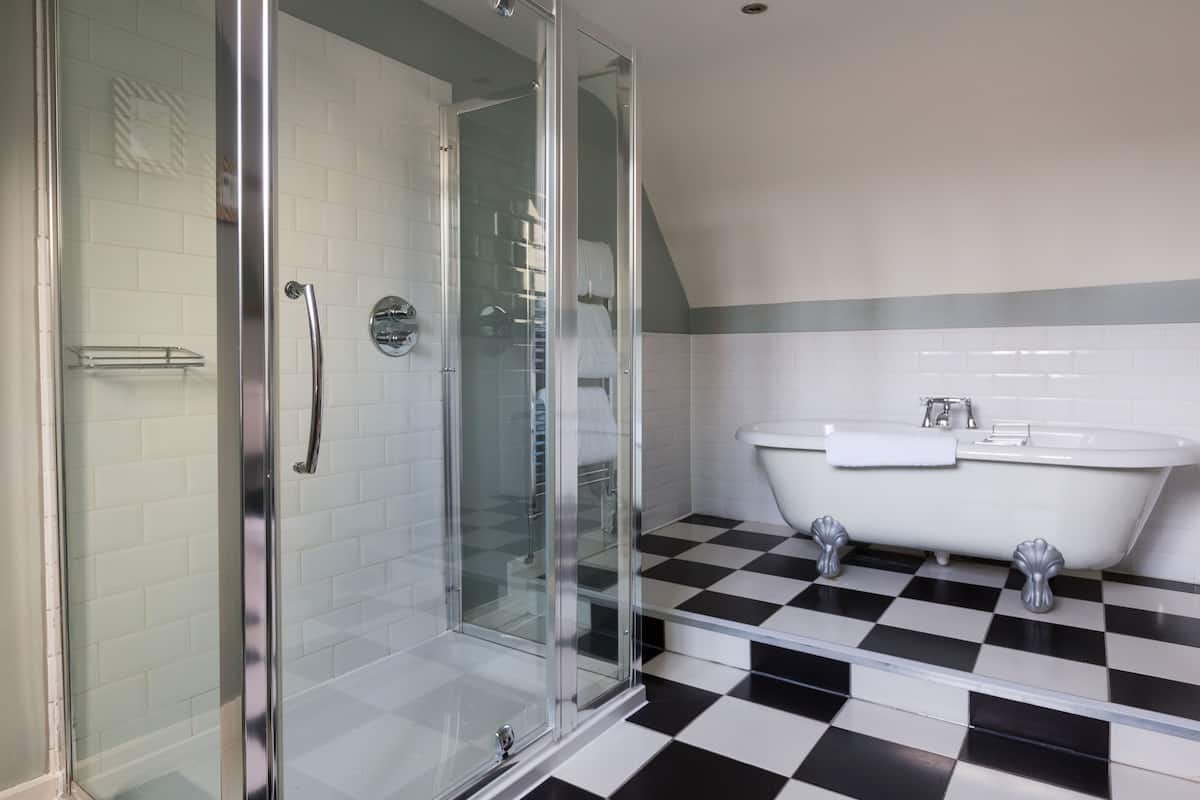 luxury room, 1 king bed | bathroom | shower, free toiletries, hair dryer, towels