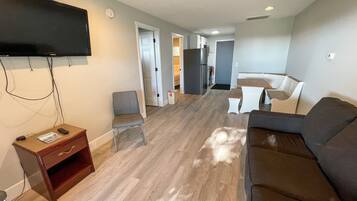 Two Bedroom Large Suite | Living area | 60-inch TV with digital channels, Netflix, Hulu