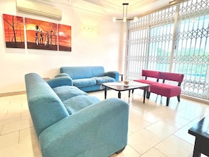 Apartment, 3 Bedrooms, Kitchen, City View | Living area | Flat-screen TV