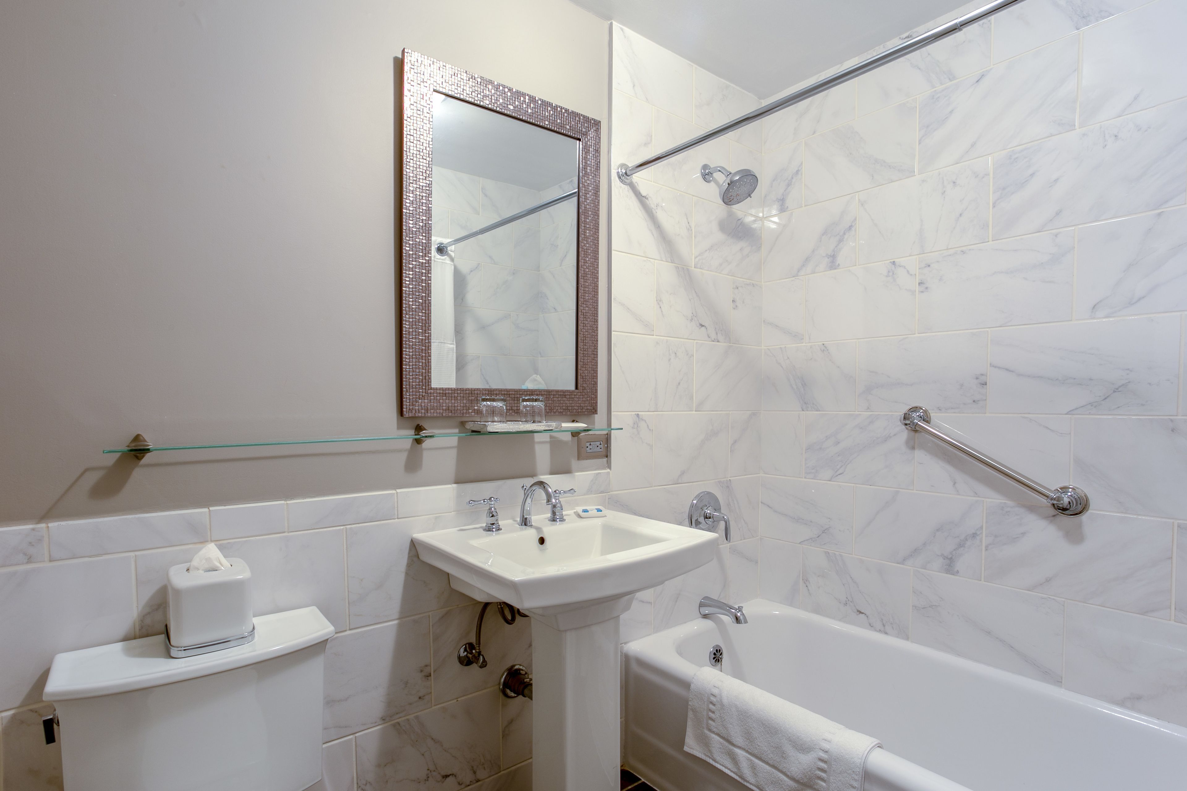 combined shower/bathtub, free toiletries, hair dryer, towels