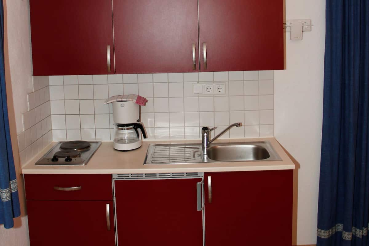 family loft, 2 bedrooms, balcony, mountain view | private kitchenette | high chair