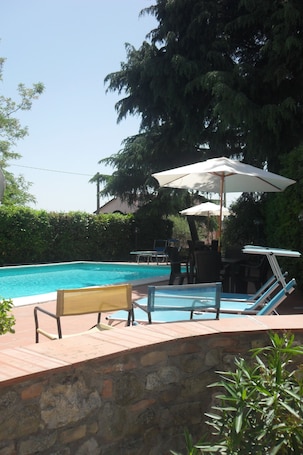Seasonal outdoor pool, pool umbrellas, sun loungers
