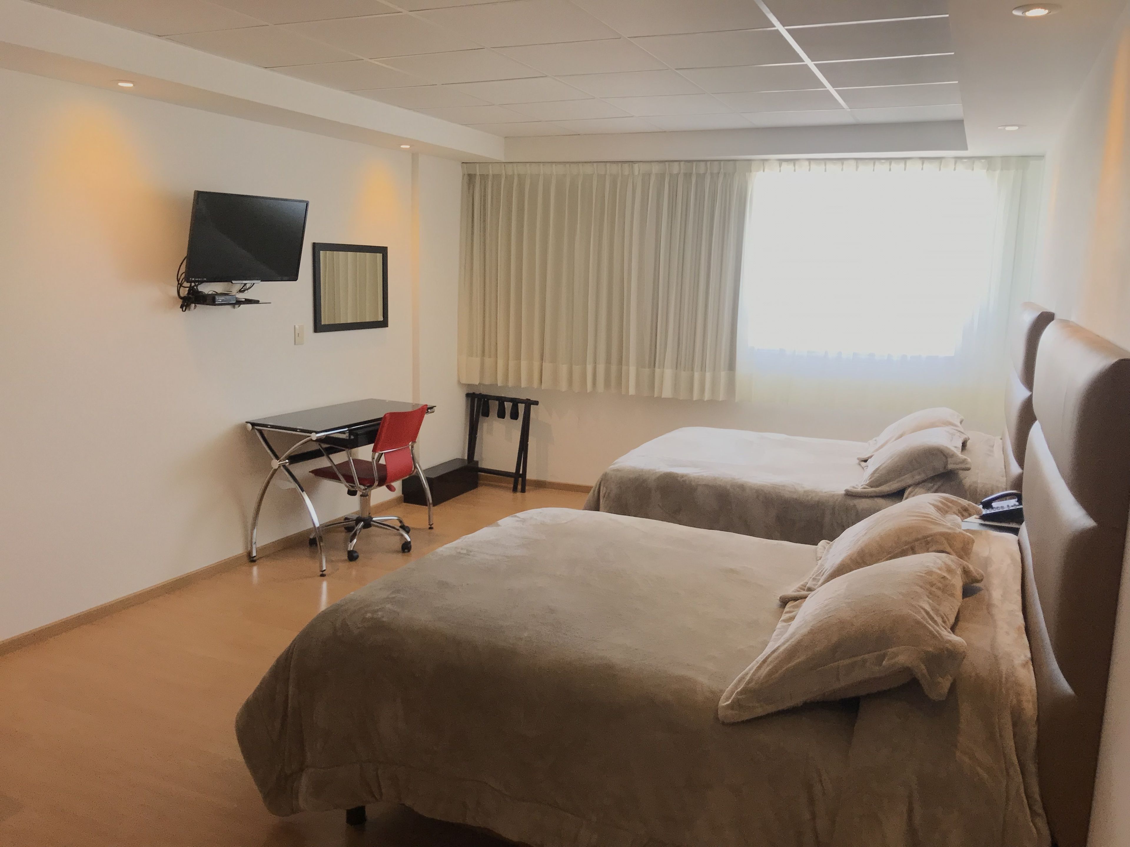 deluxe double room, 2 queen beds, kitchen | minibar, in-room safe, desk, soundproofing