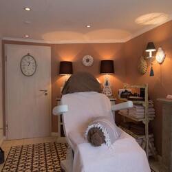 Sauna, steam room, body treatments, hot stone massages, facials
