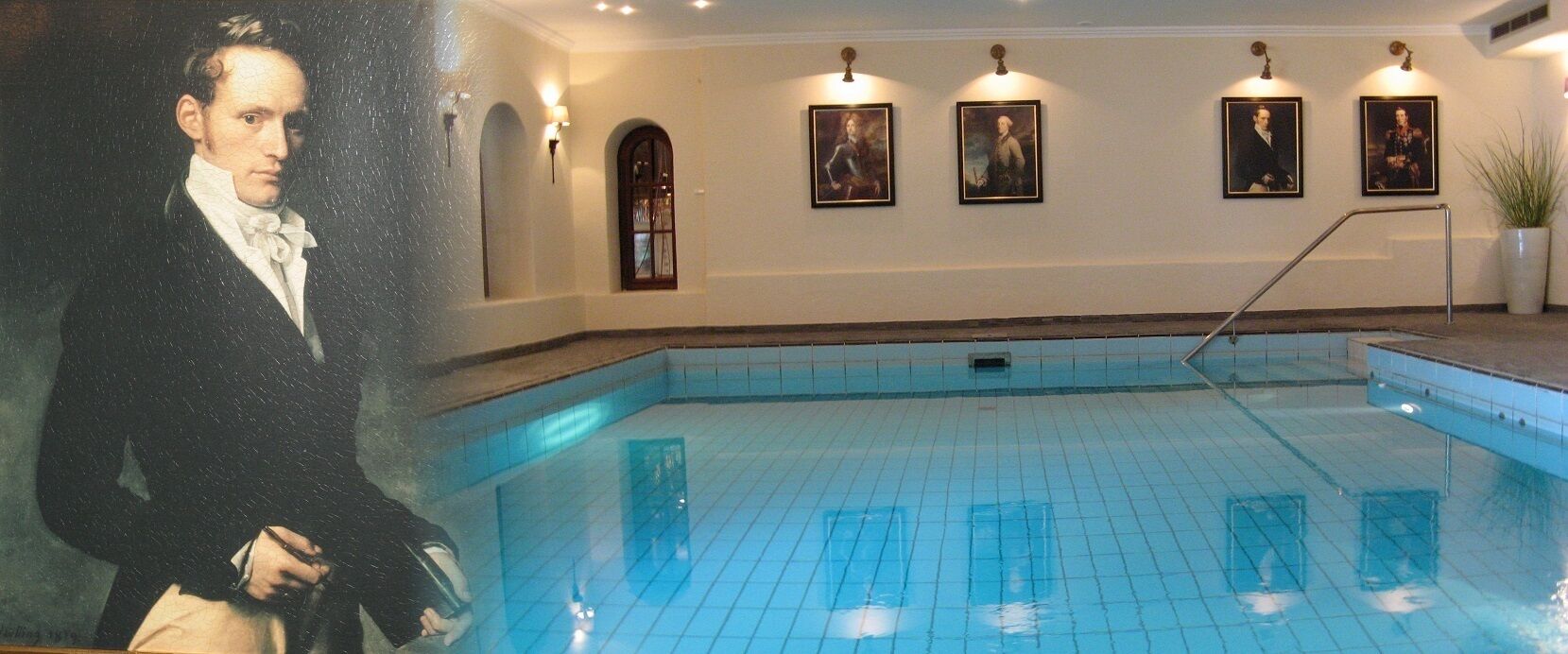 A swimming pool with tiled flooring and a handrail.