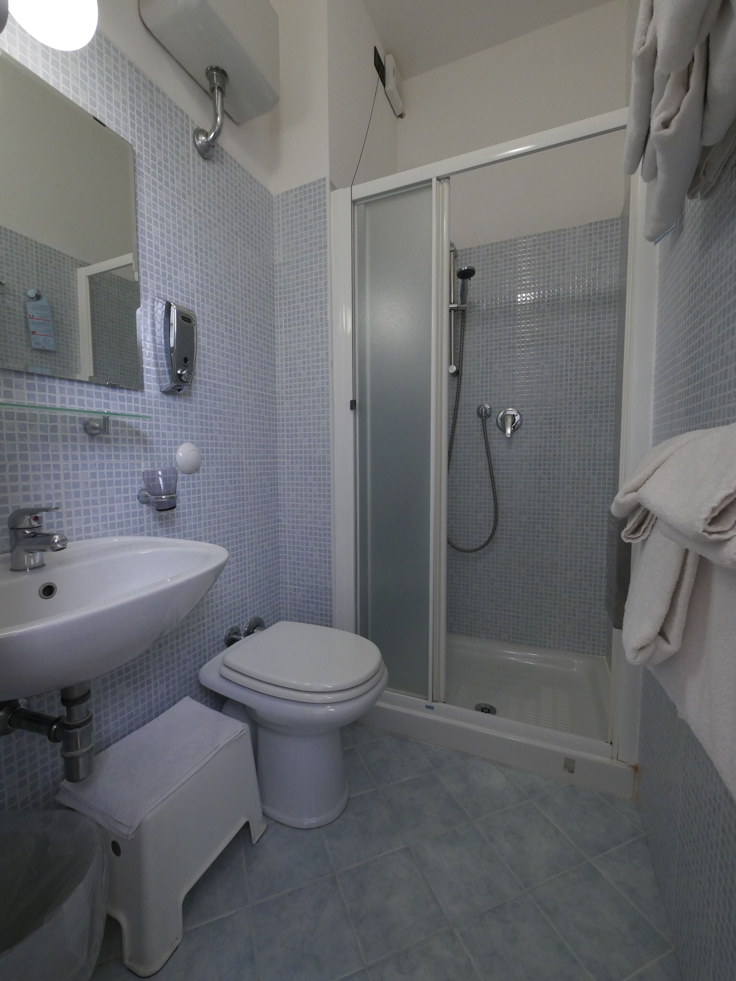 quadruple room | bathroom | shower, rainfall showerhead, free toiletries, hair dryer