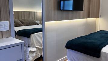 Deluxe Double Room | Minibar, desk, blackout drapes, free WiFi