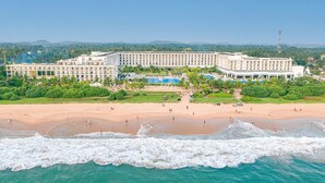 A large resort with a beachfront, multiple swimming pools, and a central courtyard. - Hotel Riu Sri Lanka - All Inclusive (Ahungalla)
