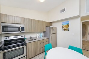 Family Apartment, 2 Bedrooms, Kitchen | Private kitchen | Microwave, coffee/tea maker