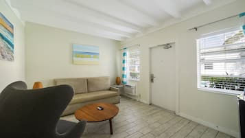 Junior Apartment, 1 King Bed with Sofa bed, Private Bathroom (Self check-in) | Living area | 42-inch Smart TV with satellite channels