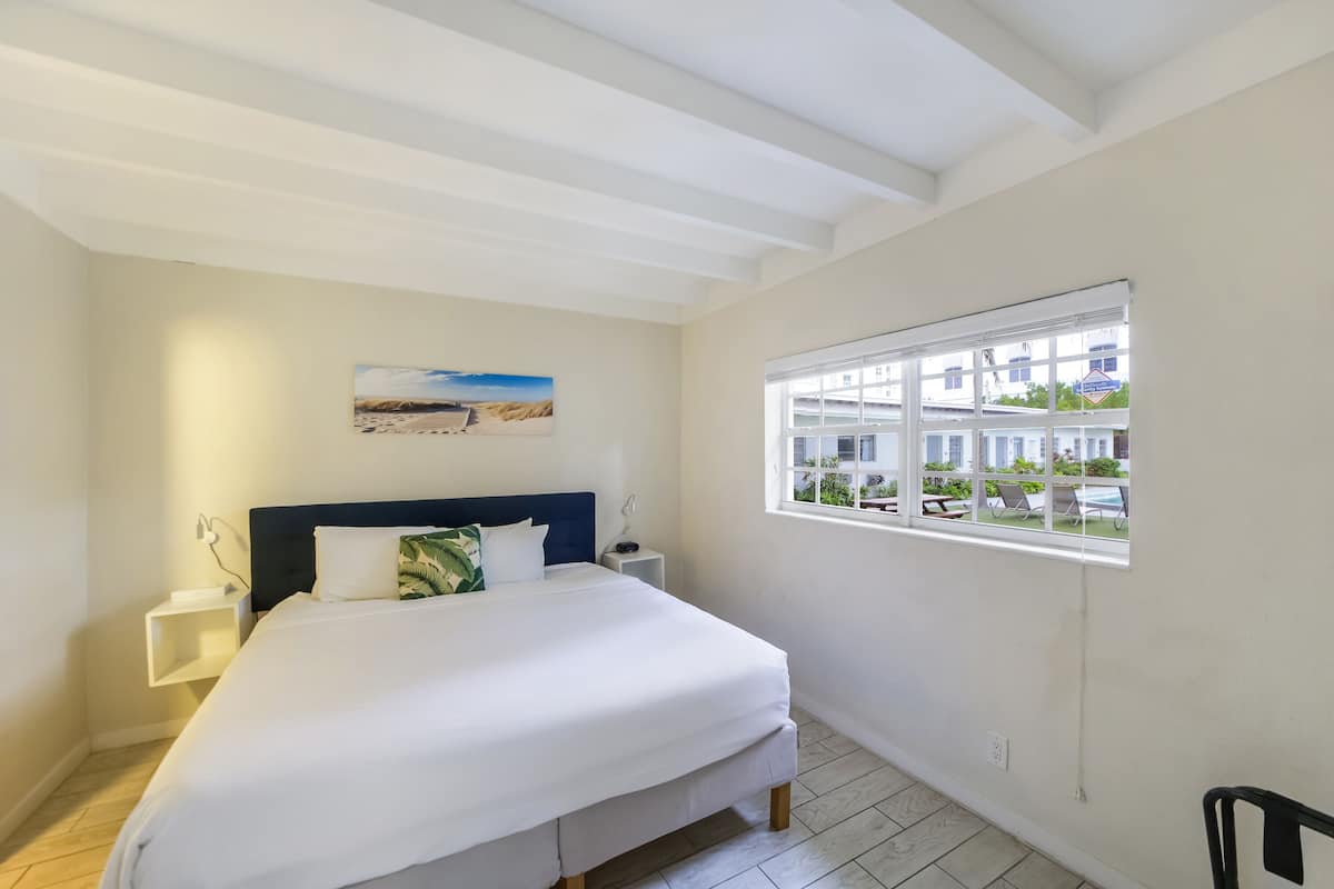 Family Apartment, 2 Bedrooms, Kitchen (Self check-in) | In-room safe, desk, laptop workspace, blackout drapes