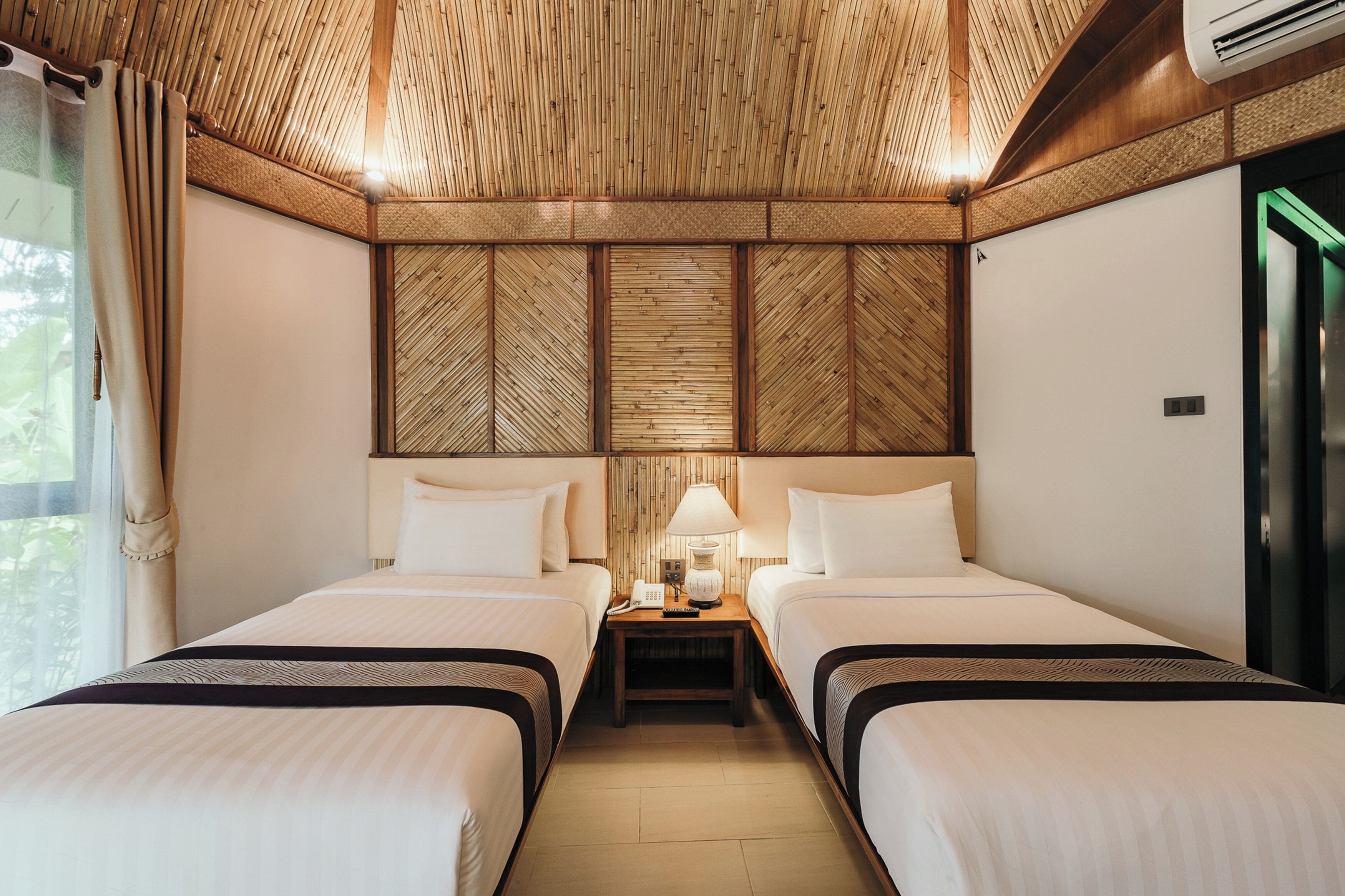 deluxe twin room | hypo-allergenic bedding, in-room safe, desk, blackout curtains