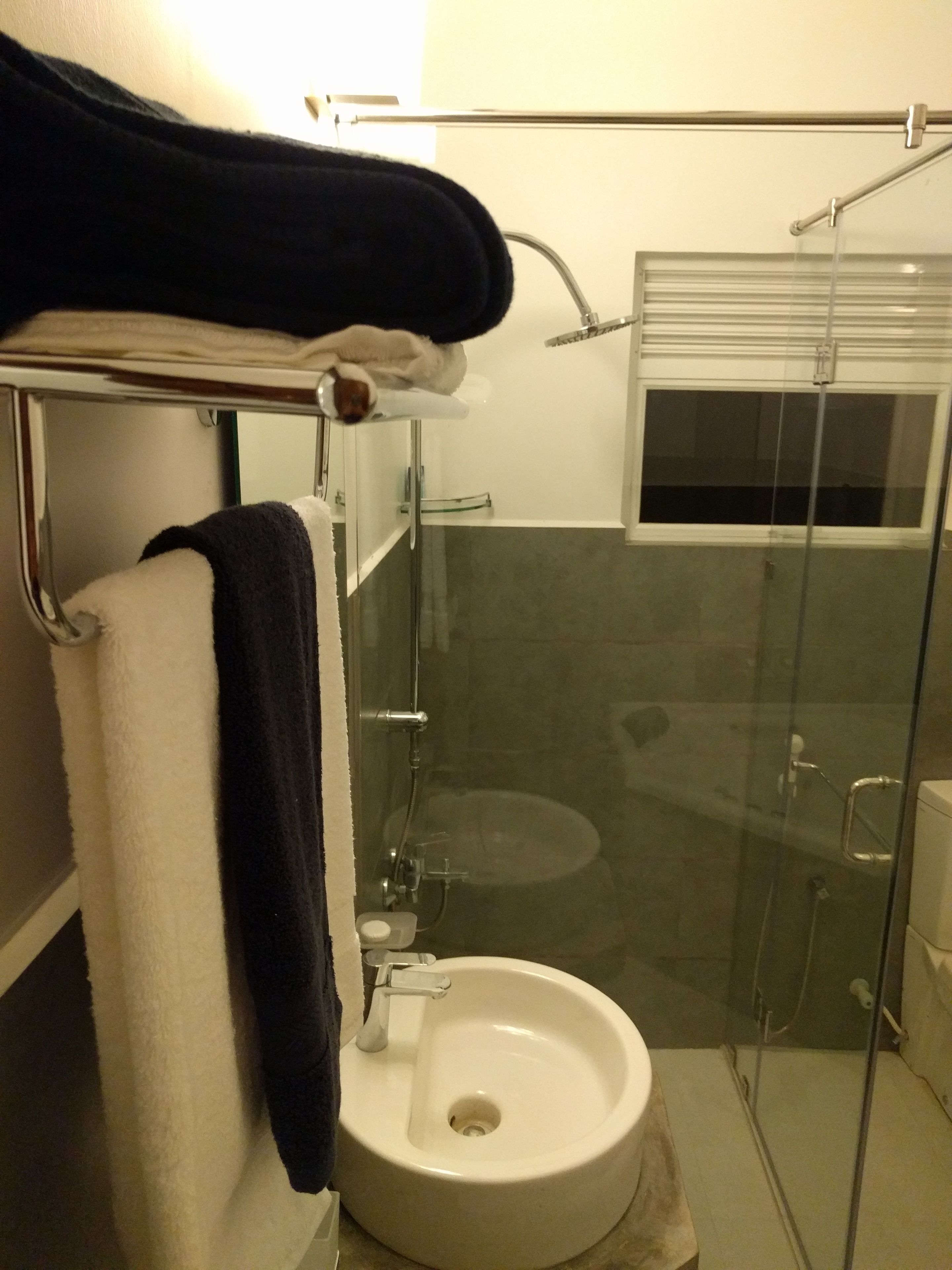 double room, 1 king bed | bathroom | shower, free toiletries, hair dryer, towels