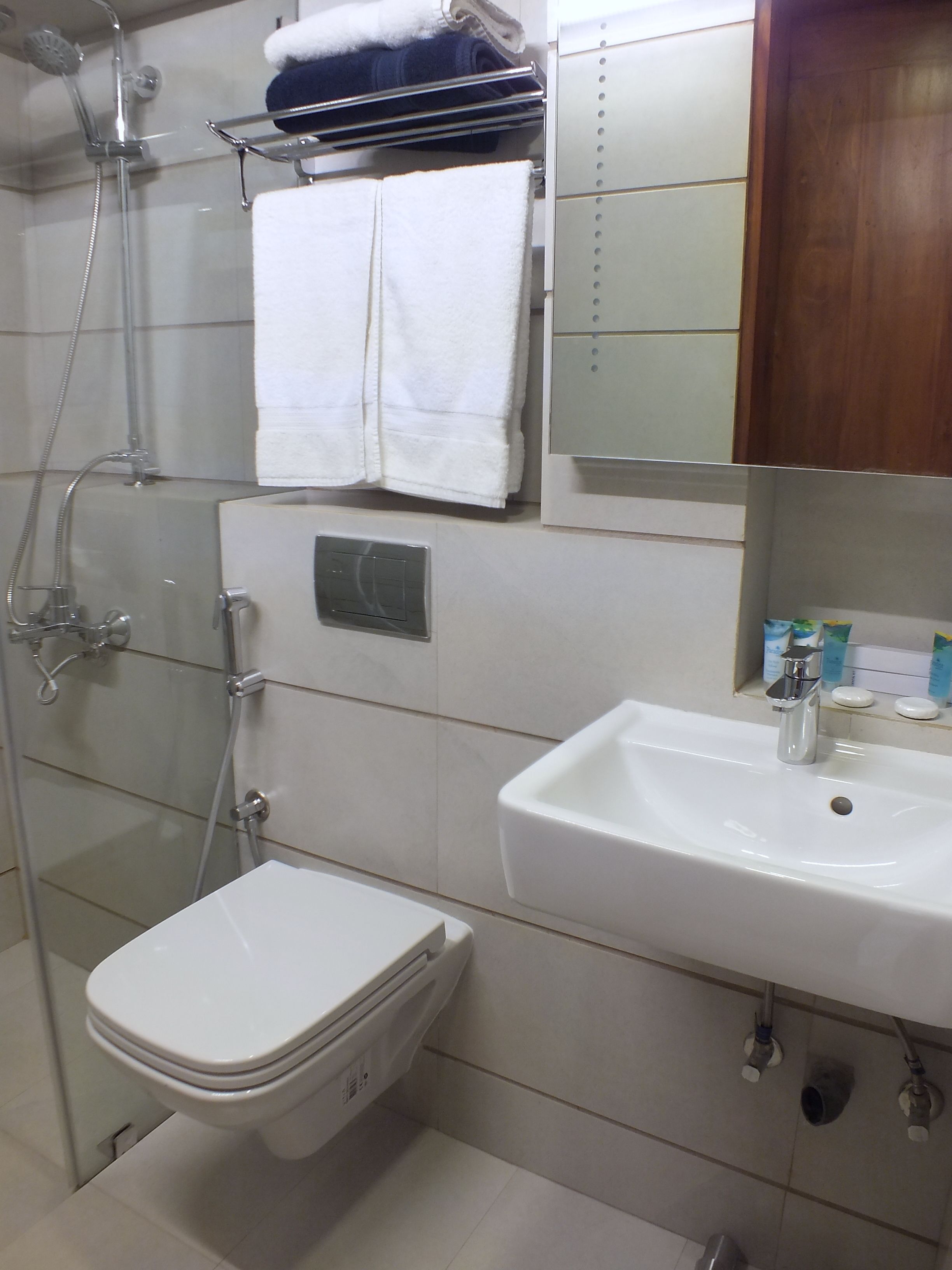 family room | bathroom | shower, free toiletries, hair dryer, towels