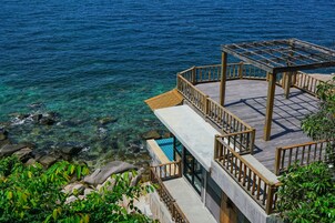 Honeymoon Villa, 1 King Bed, Balcony, Sea View | 1 bedroom, minibar, in-room safe, individually decorated