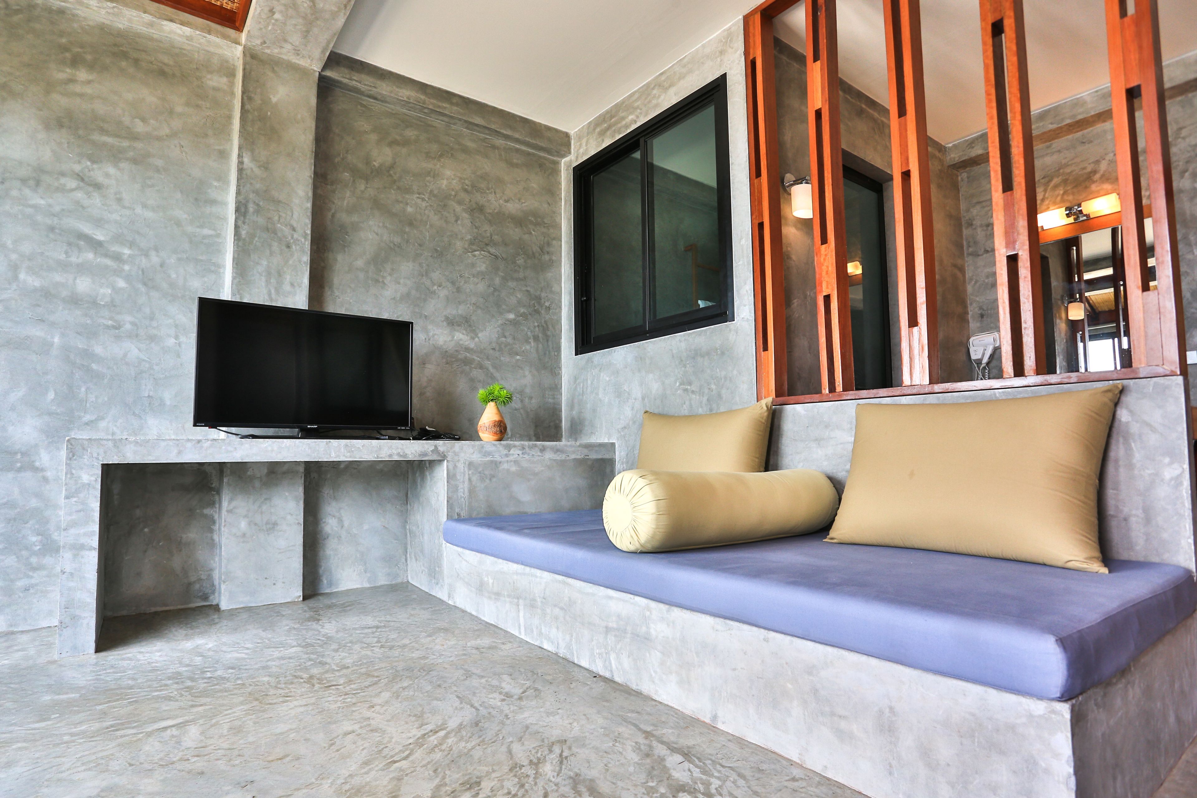 junior room, 1 king bed, beach view, beachfront | minibar, in-room safe, desk, laptop workspace