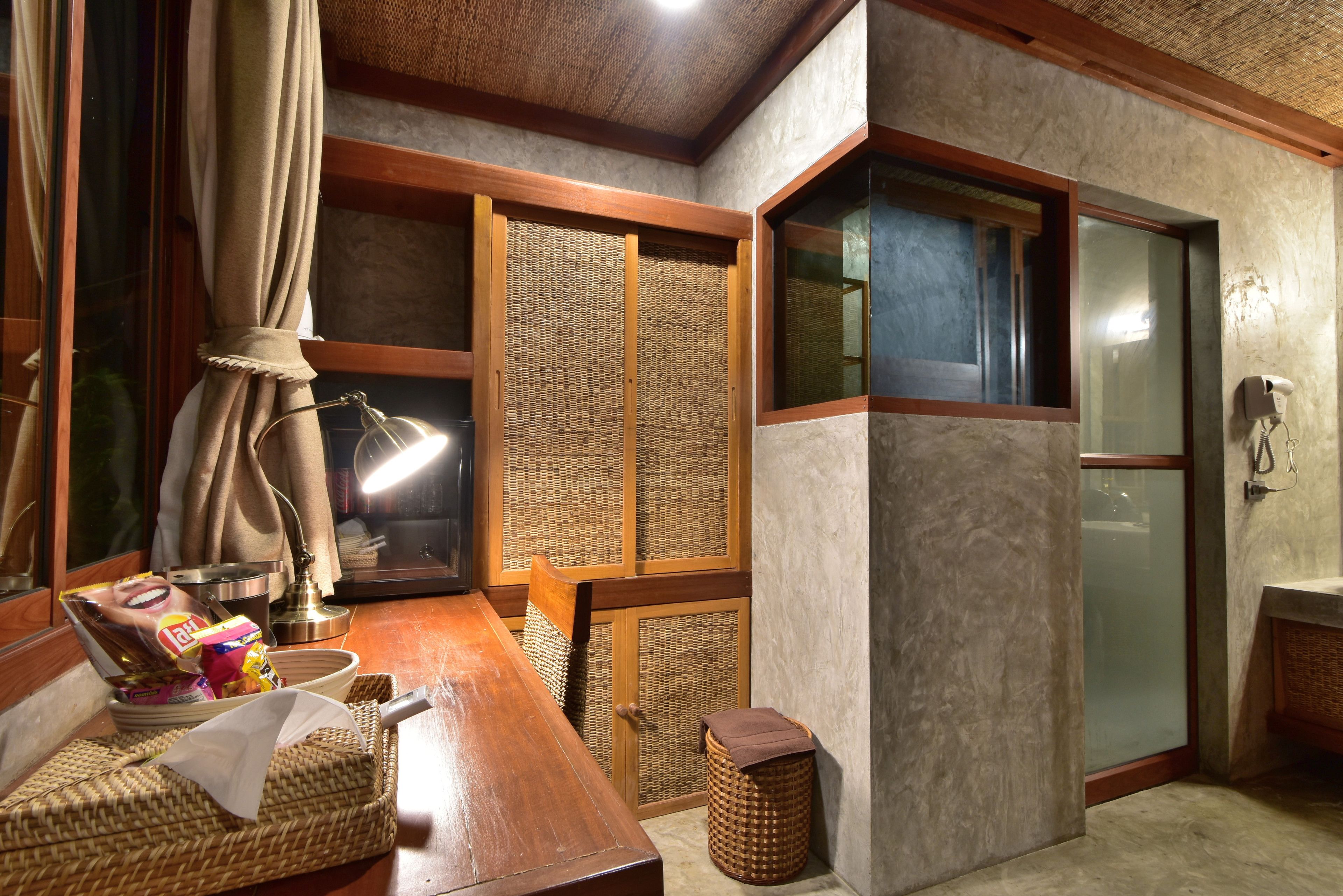 deluxe room, 1 king bed, beach view, beachfront | minibar, in-room safe, desk, laptop workspace