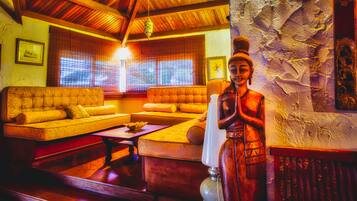 Superior Villa, 6 Bedrooms, Ocean View, Beachside | Living room | Flat-screen TV, fireplace