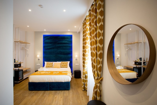 Superior Room (Queen) (Via Napoli 45) | 2 bedrooms, down comforters, minibar, in-room safe