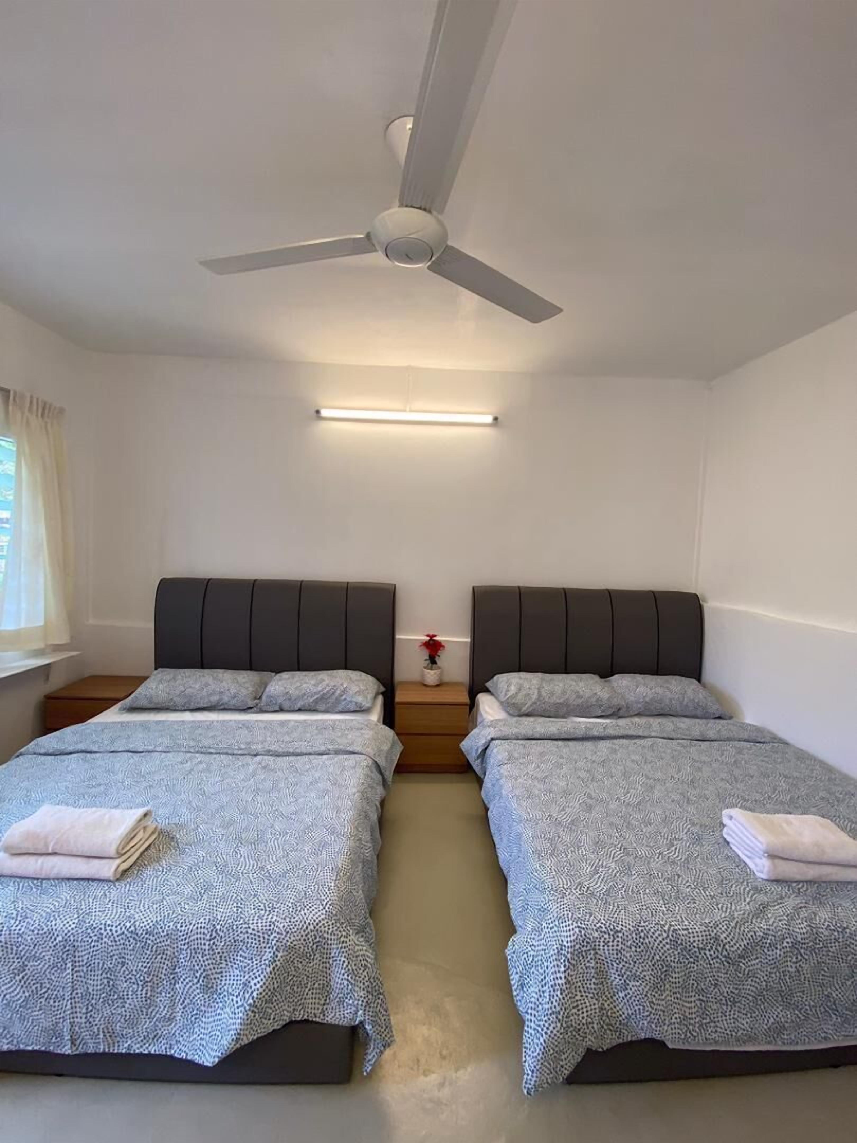 Habitación familiar, 2 camas Queen size, baño compartido | Wifi y ropa de cama 