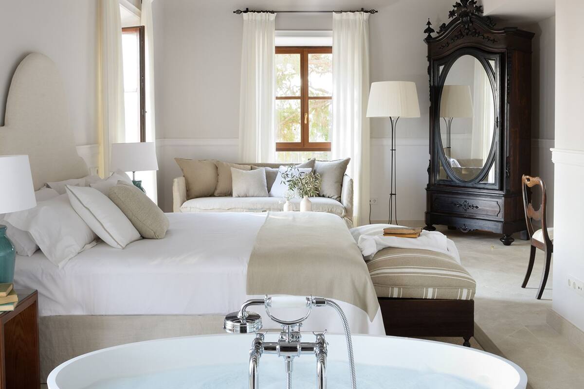 luxury romance room | premium bedding, in-room safe, individually decorated, soundproofing